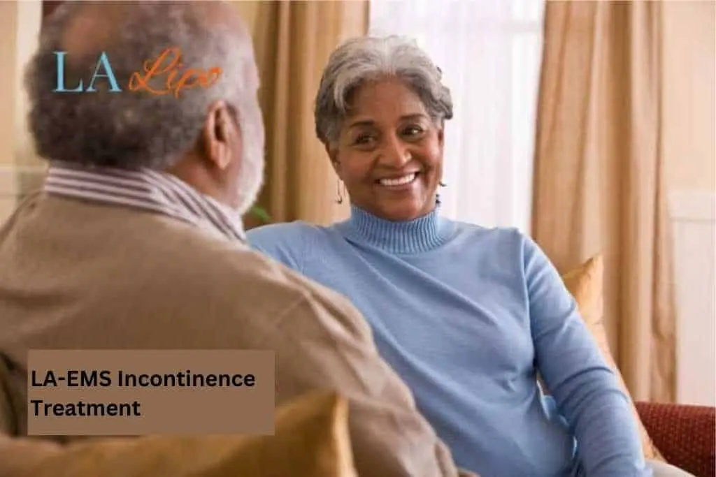 Couple sat smiling at each other - LA-EMS treatment Potters Bar