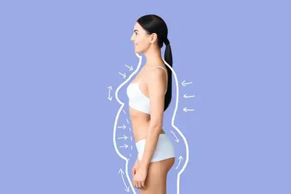 image of woman experiencing fat reduction treatment Potters Bar